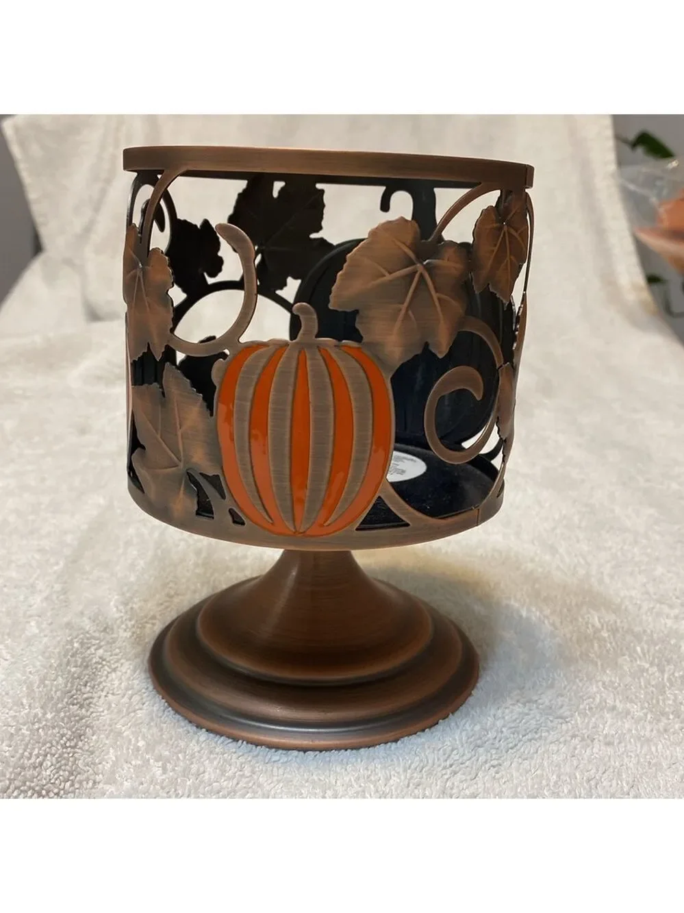 Retired Bath and Body Works Pumpkin candle holder, pedestal style.